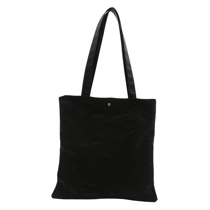 Women's tote bag made of high-quality synthetic leather with a textured surface