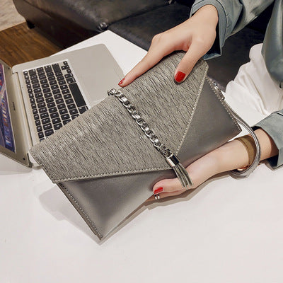 Women's clutch with stylish chain accent
