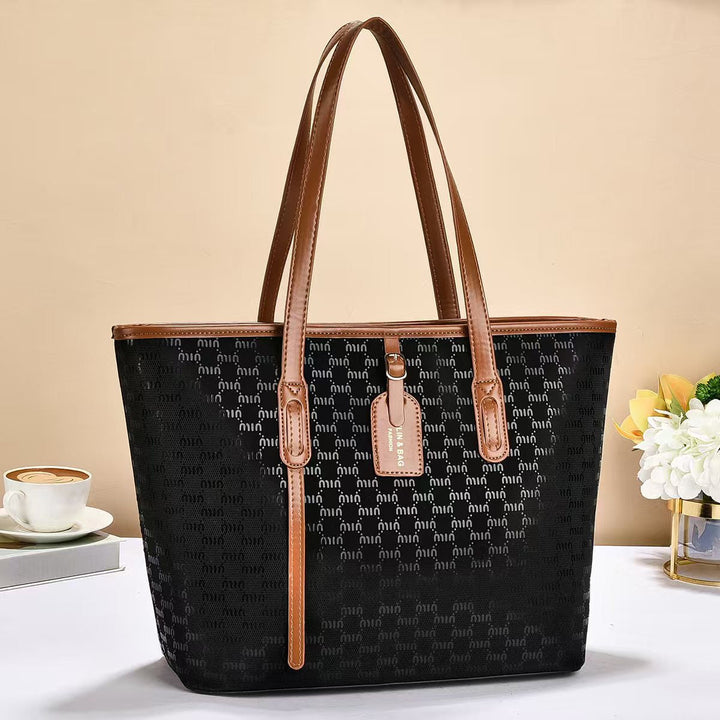 Women's tote bag with luxurious design and structured outer material