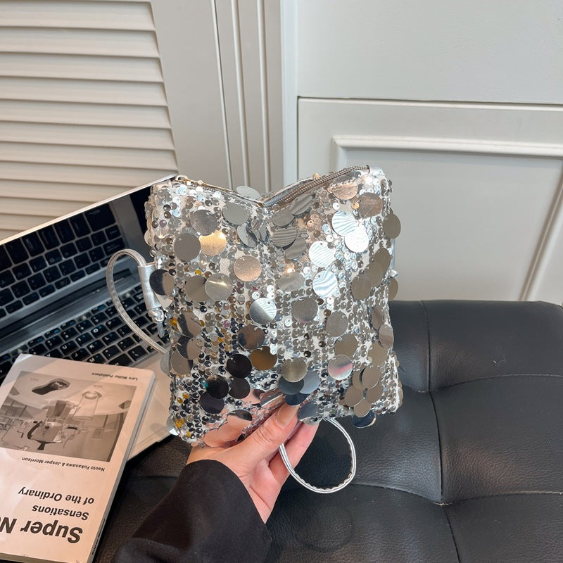 Women’s shoulder bag with sparkly sequin design