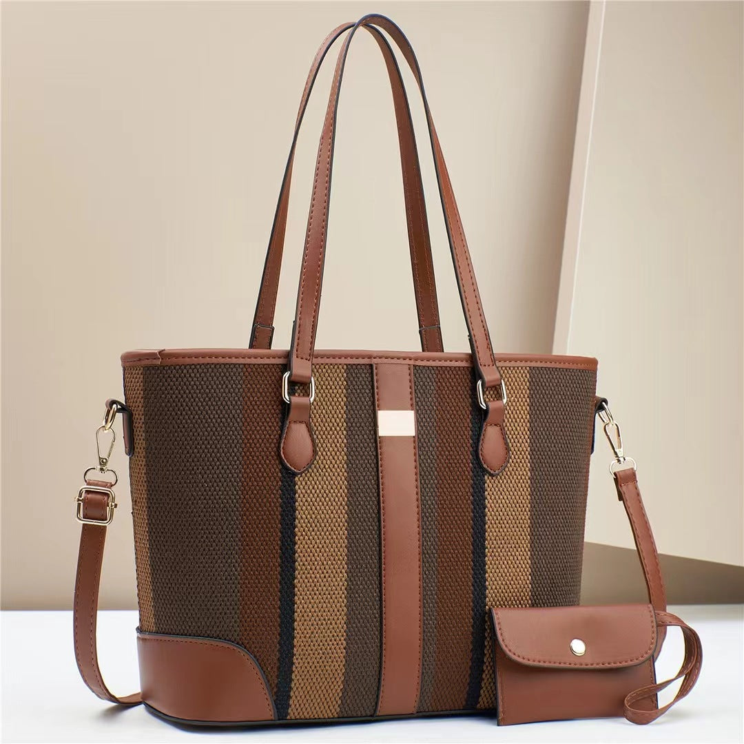 Women's tote bag with textured outer material and removable mini clutch