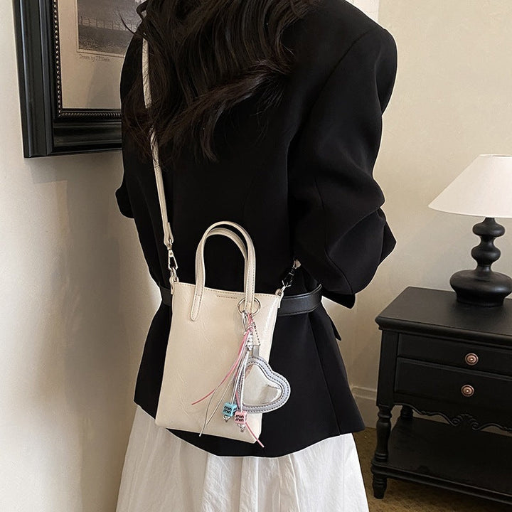 Ladies mini handbag with elegant pendant