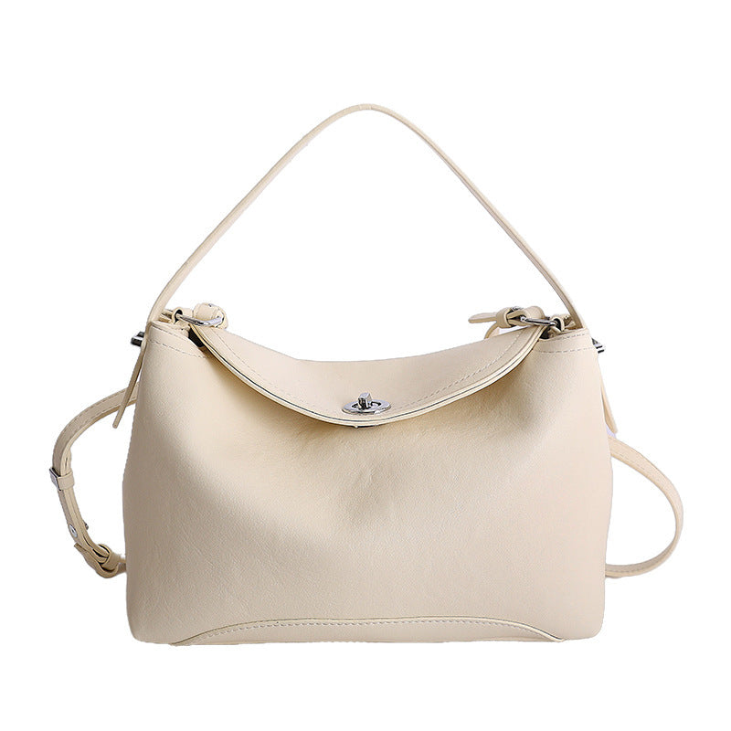 Women's handbag with flexible strap and elegant design
