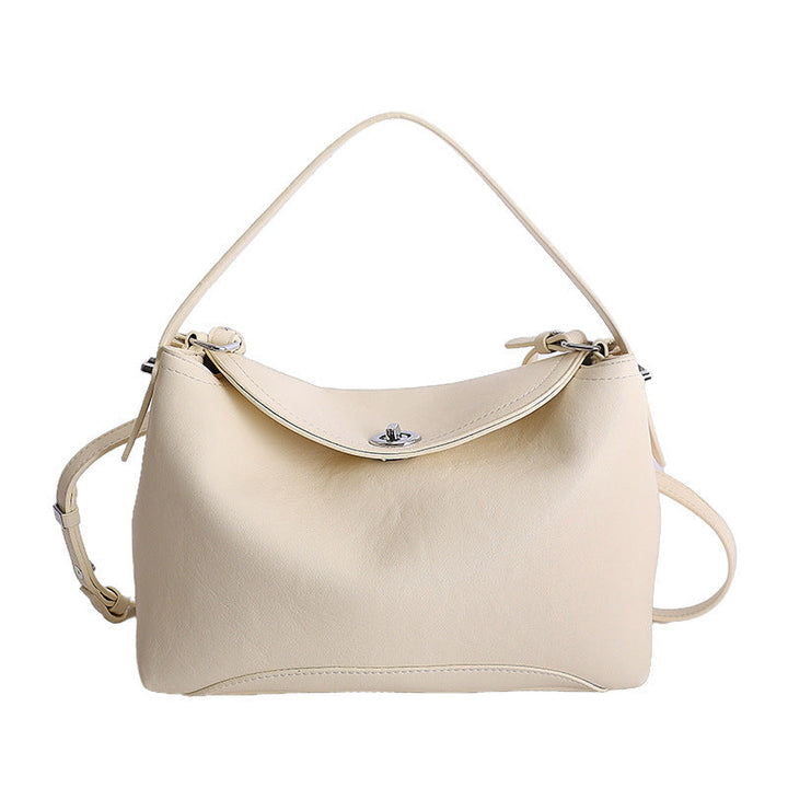Women's handbag with flexible strap and elegant design