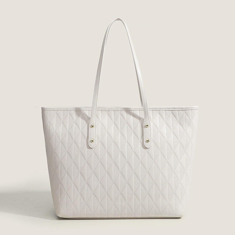 Women's tote bag with elegant diamond design and practical inner compartments