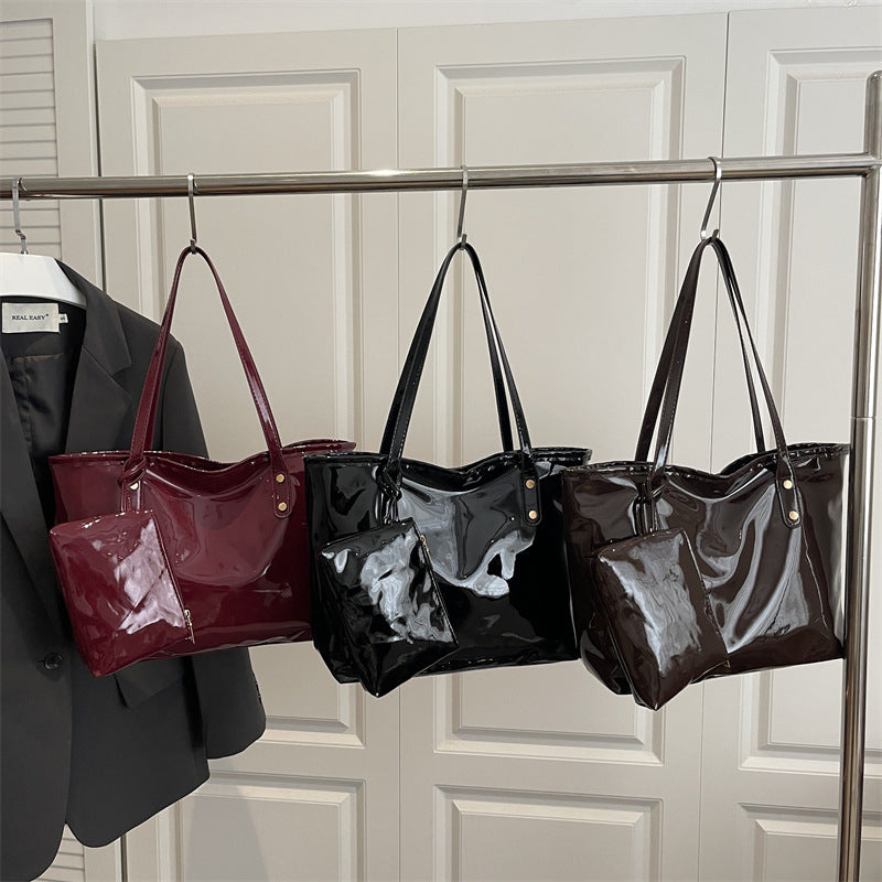 Women's elegant patent leather tote with removable interior compartment