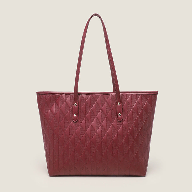 Women's tote bag with elegant diamond design and practical inner compartments