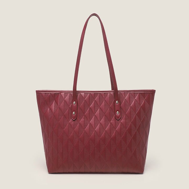 Women's tote bag with elegant diamond design and practical inner compartments