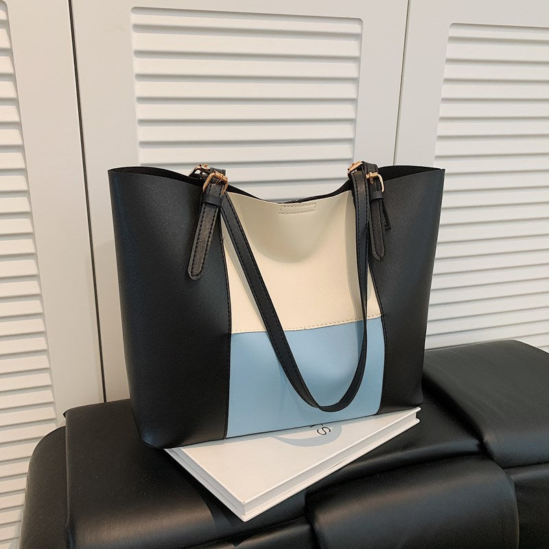 Women's spacious tote bag with elegant color block details