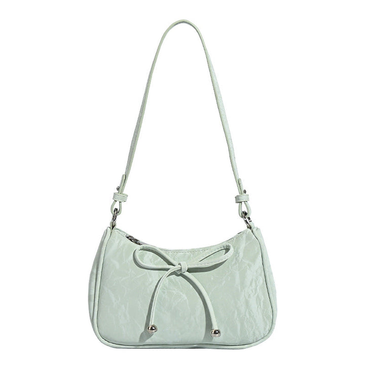 Ladies elegant mini handbag with playful drawstring