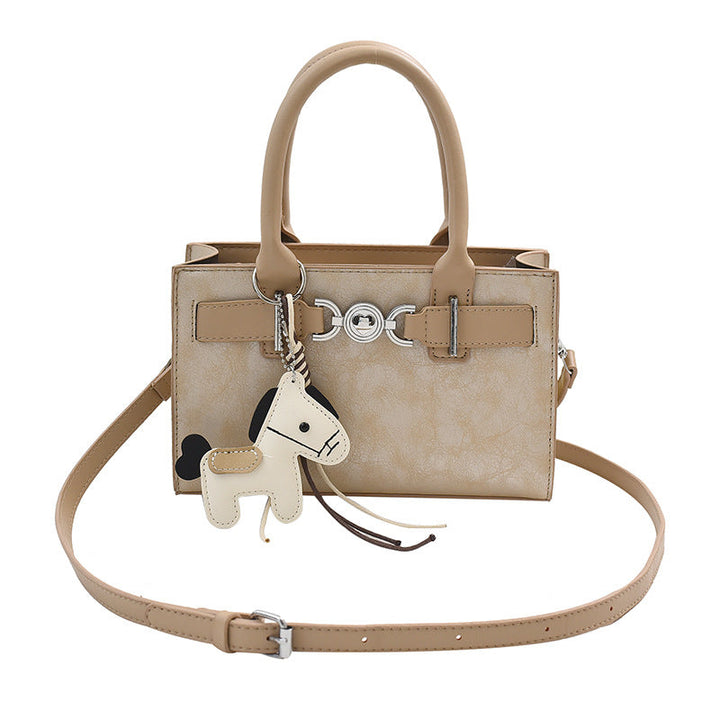 Women's handbag in modern minimalist style with playful charm