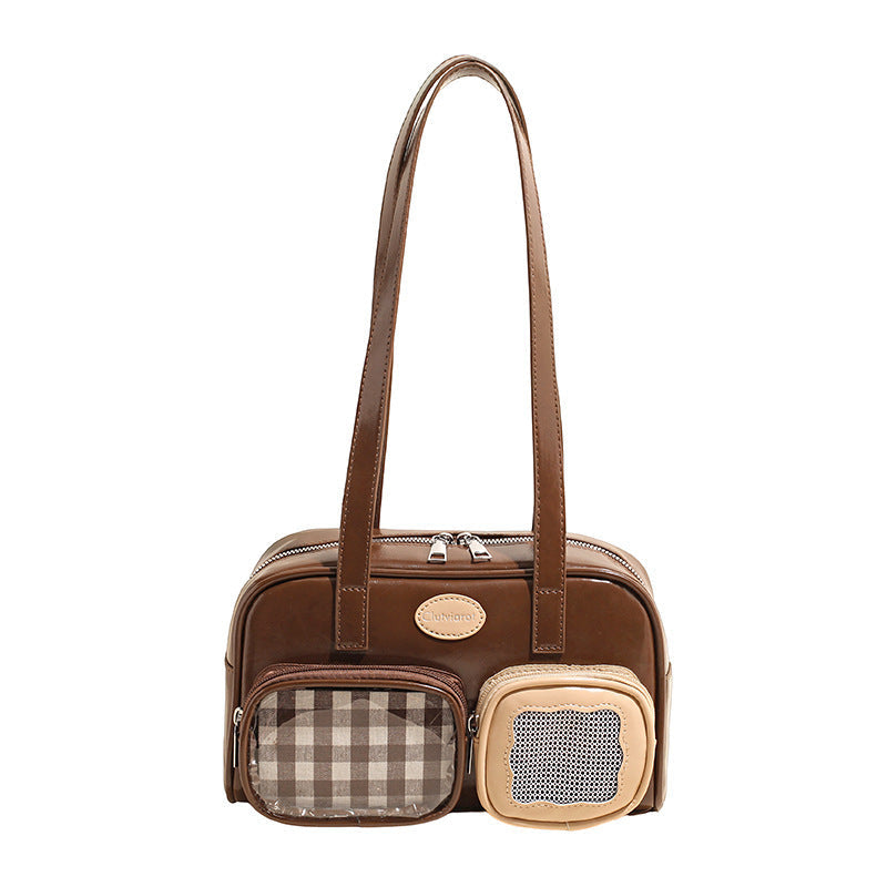 Women's shoulder bag with unique drawstring and charming pendant