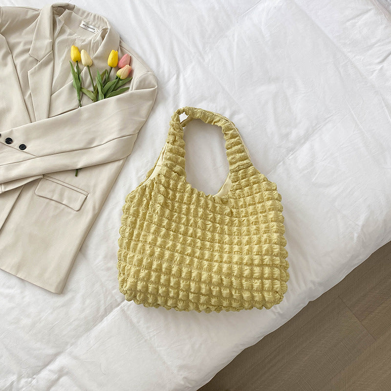 Women's tote bag with textured design