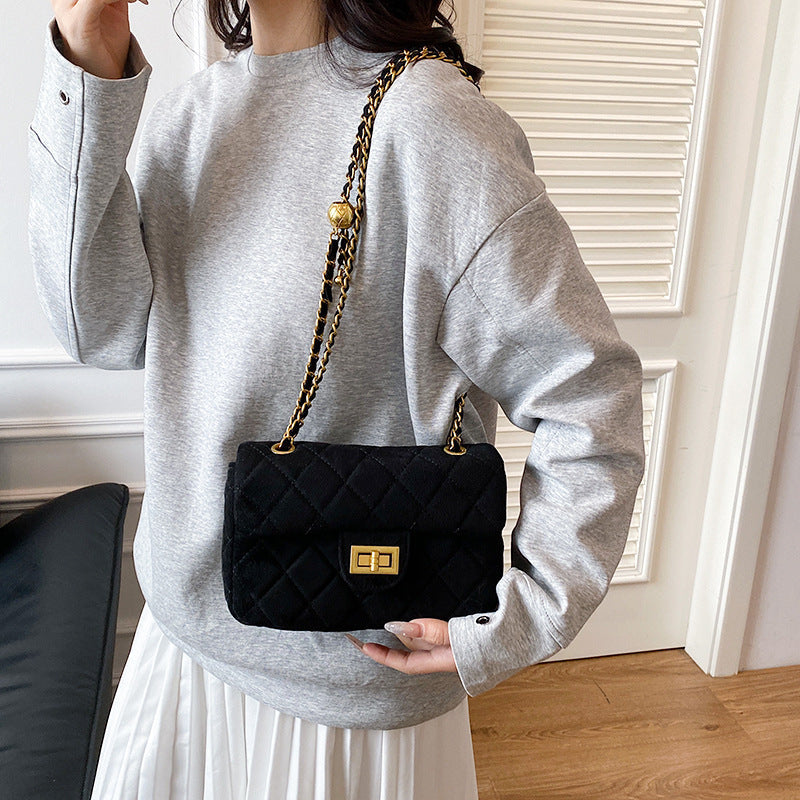 Women's elegant shoulder bag with stylish chain accent