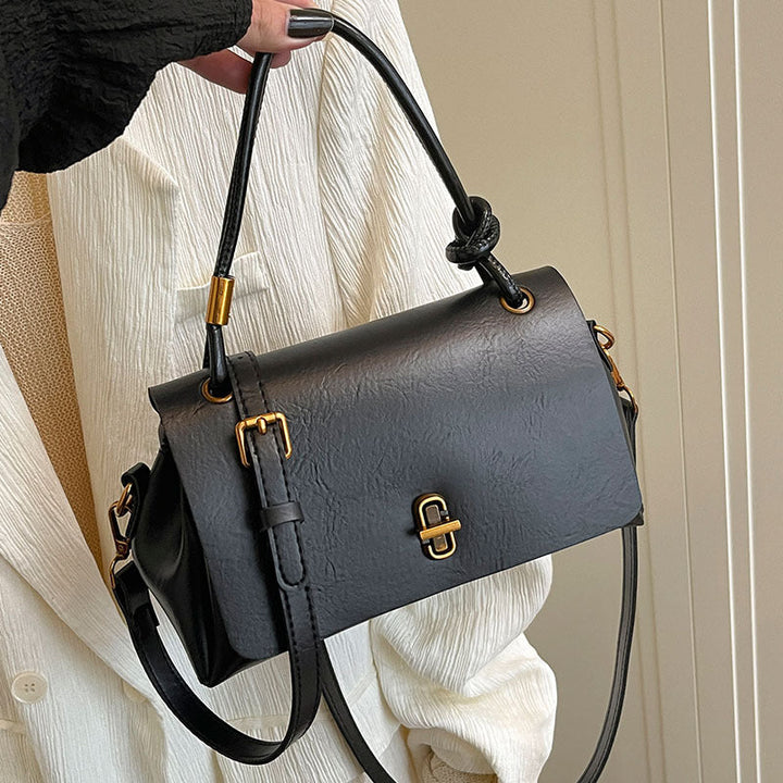 Women's elegant handbag with detachable shoulder strap