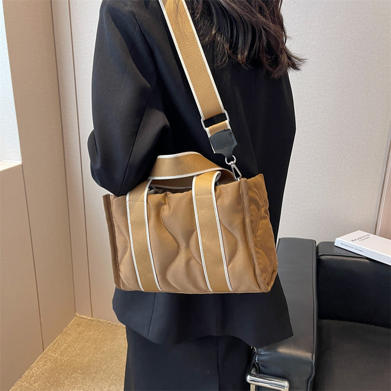 Women's practical shoulder bag with structured details