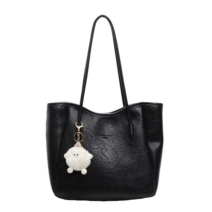 Women's Tote Bag with playful faux fur pendant