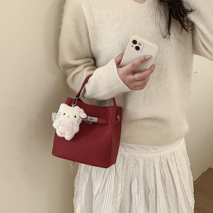 Women’s mini bag with detachable plush pendant