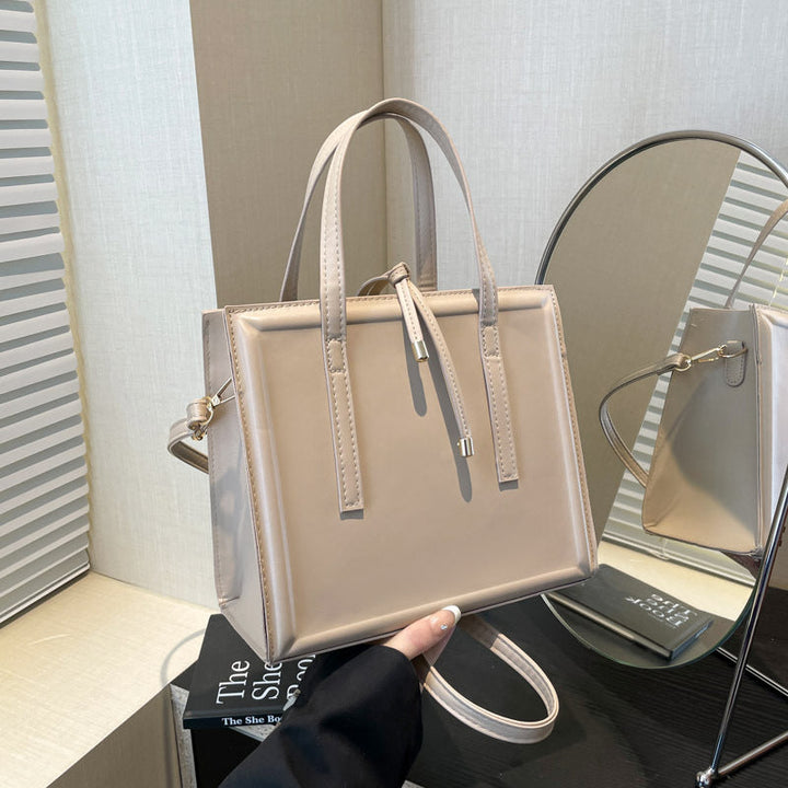 Women's elegant handbag in minimalist design with detachable shoulder strap