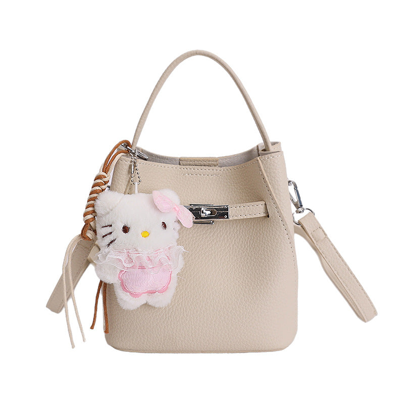 Women's mini handbag with cute charm