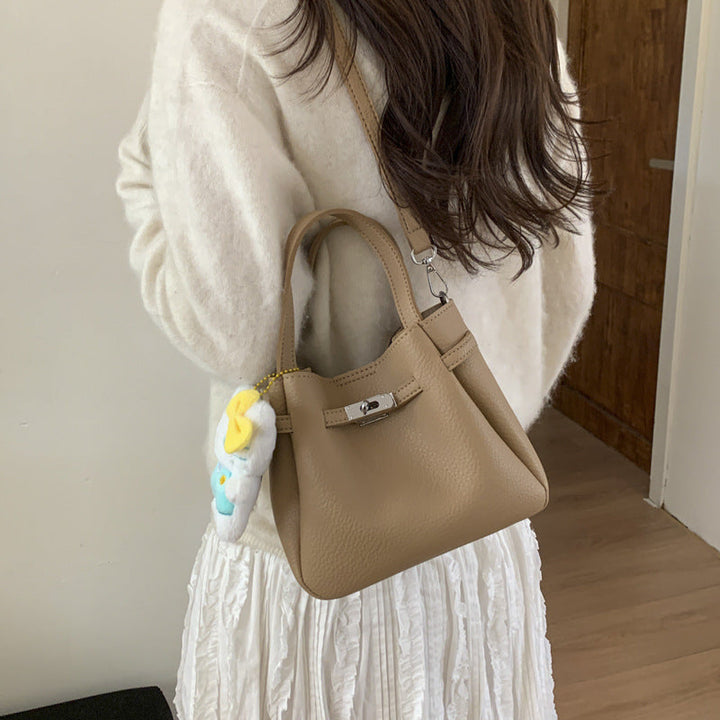 Ladies mini handbag with detachable cosmetic pouch