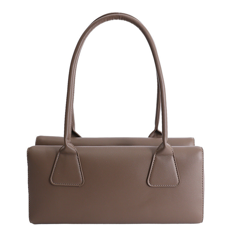 Ladies elegant handbag with minimalist silhouette