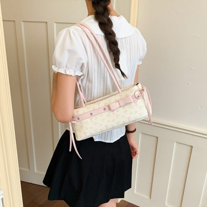Women's crossbody bag with elegant fringe design