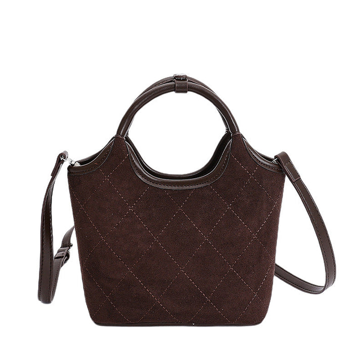 Ladies elegant handbag with high-quality suede and leather accents