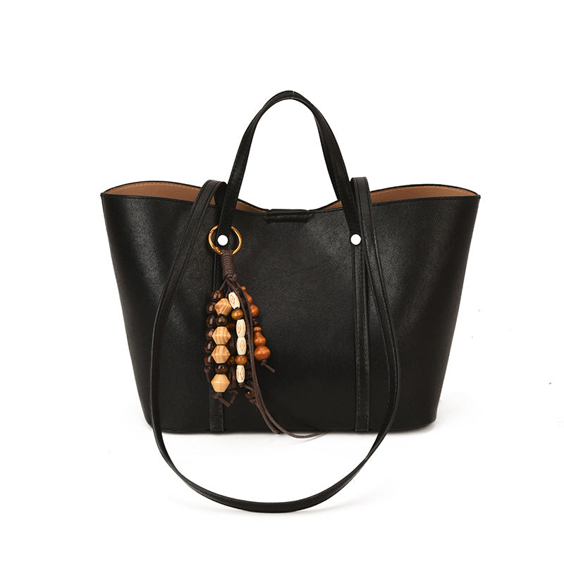 Women's Tote Bag with Modern Design and Unique Beaded Pendant