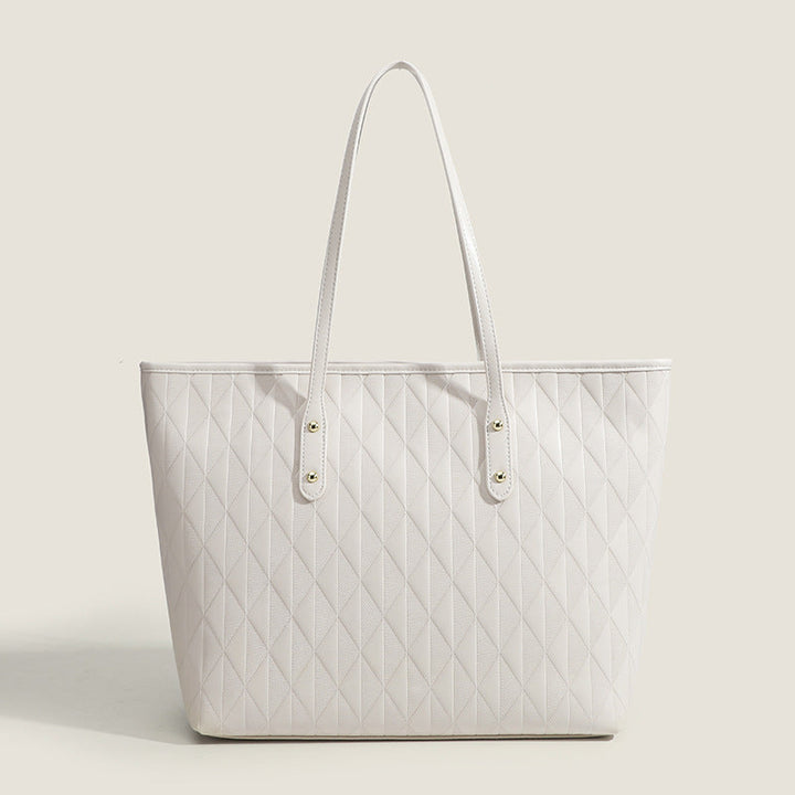 Women's tote bag with elegant diamond design and practical inner compartments