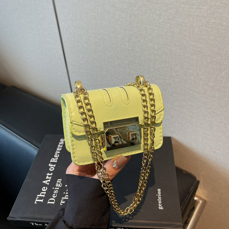 Women's mini handbag with elegant metal accents