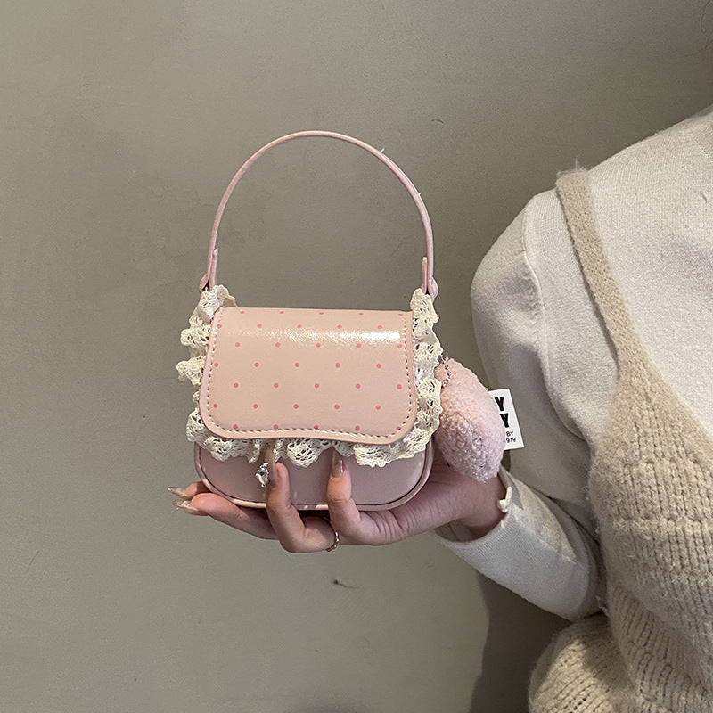Women’s mini handbag with playful design and unique details