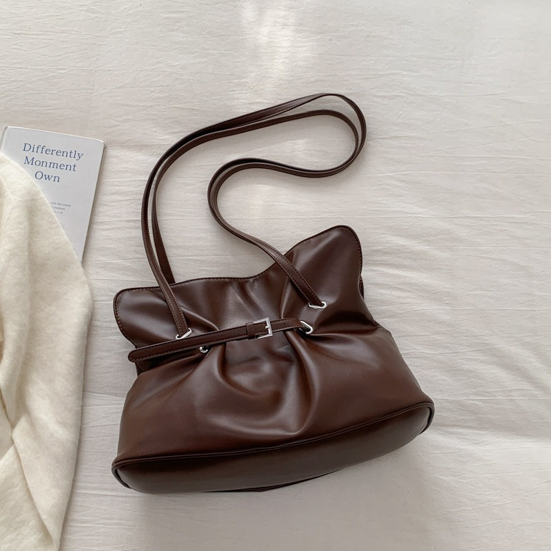 Women's shoulder bag made of high-quality synthetic leather with adjustable drawstring