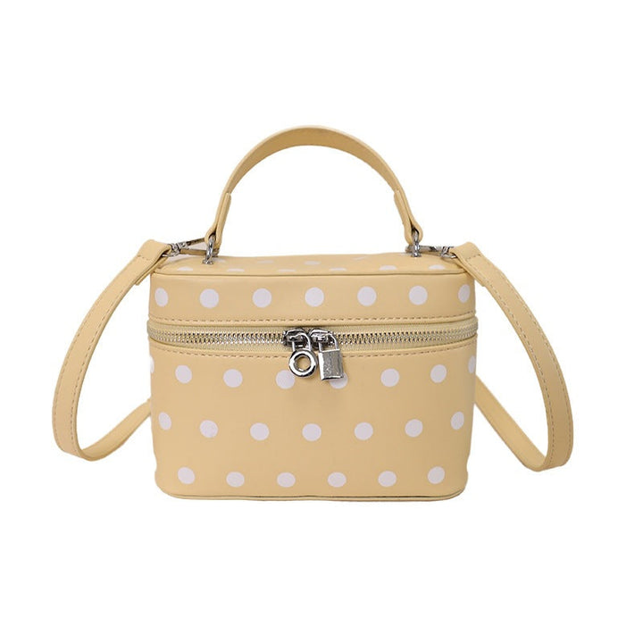 Women's mini handbag with playful design and elegant accents