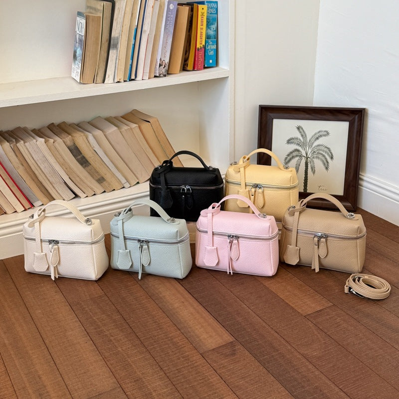 Women's practical shoulder bag with double zipper and versatile carrying strap