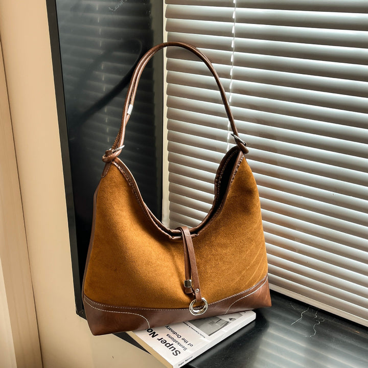 Women's elegant tote bag with authentic suede elements