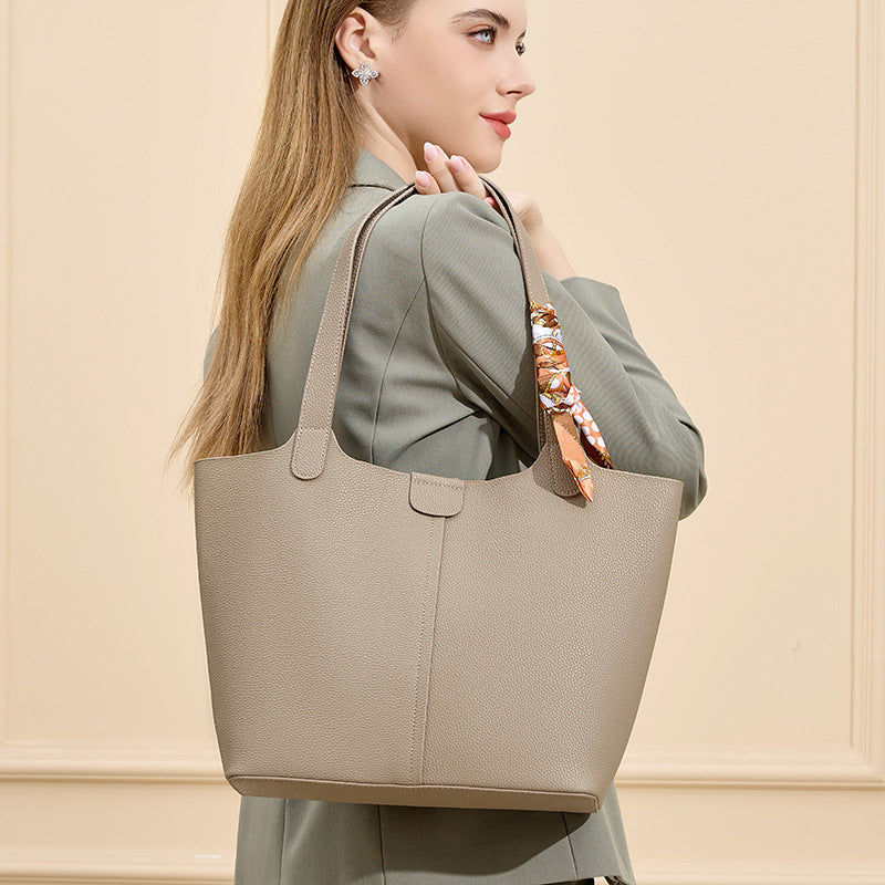 Women’s fashionable tote bag with detachable bow accessory