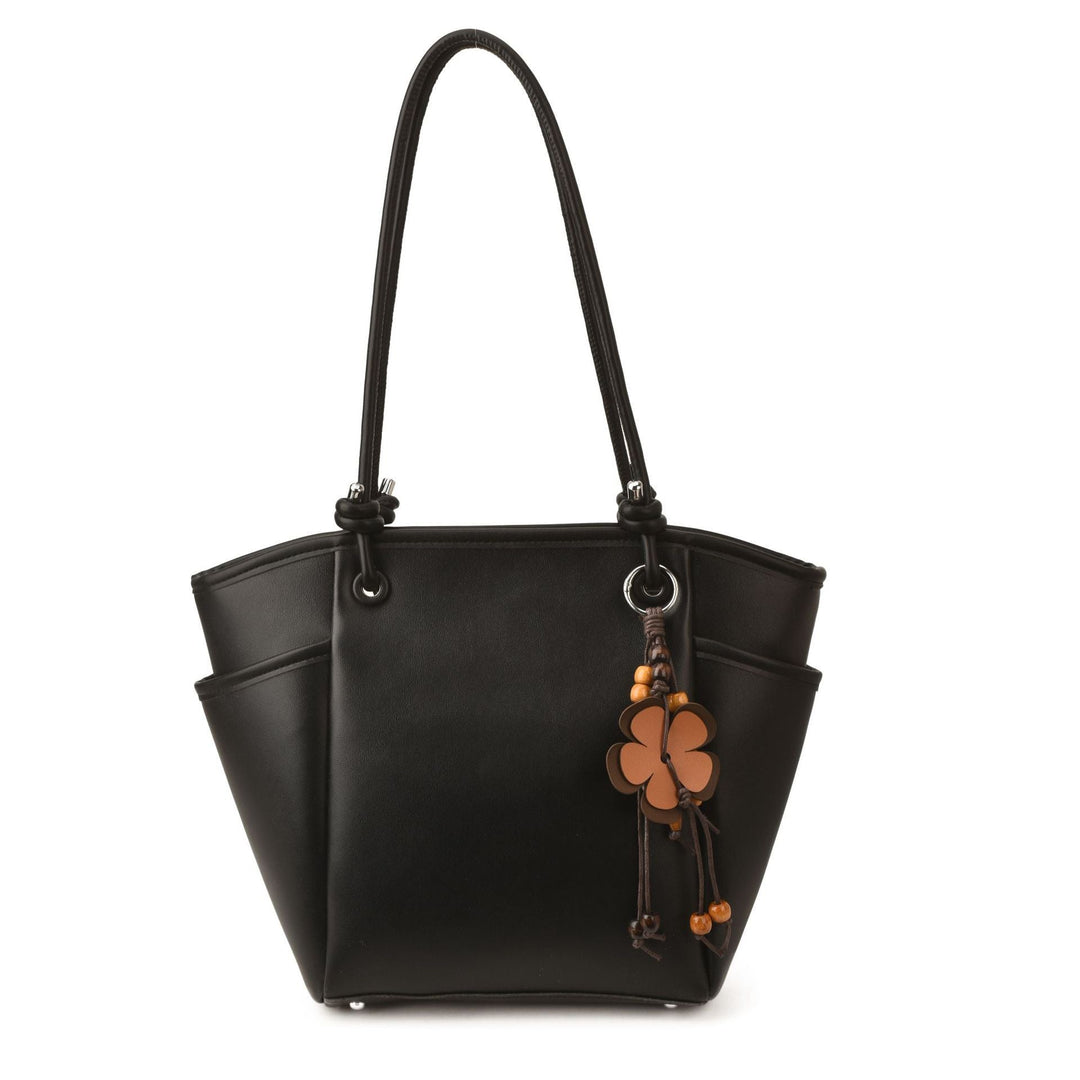 Women's practical shoulder bag with charming appliqués