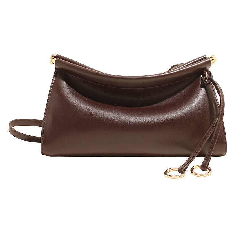 Women's elegant shoulder bag with modern, curved design