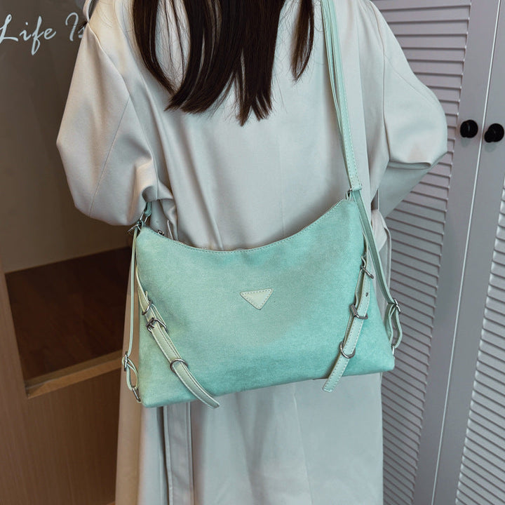 Women's shoulder bag with removable shoulder strap and modern design