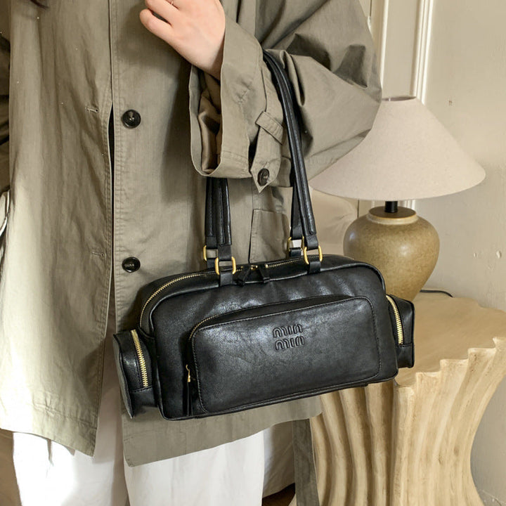 Women's elegant shoulder bag with practical organizer