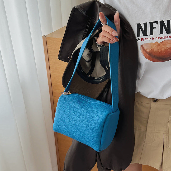Women’s shoulder bag in modern design with structured surface