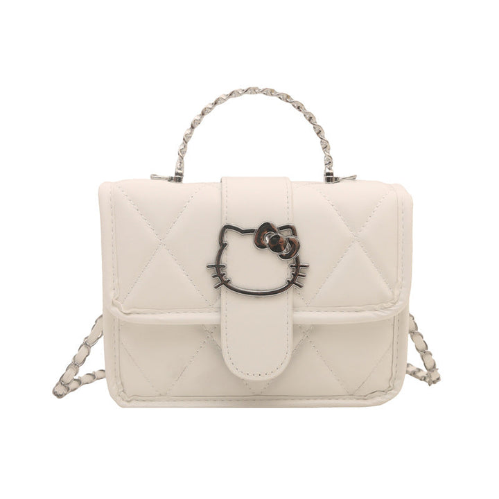 Ladies mini handbag with decorative quilting and playful cat motif