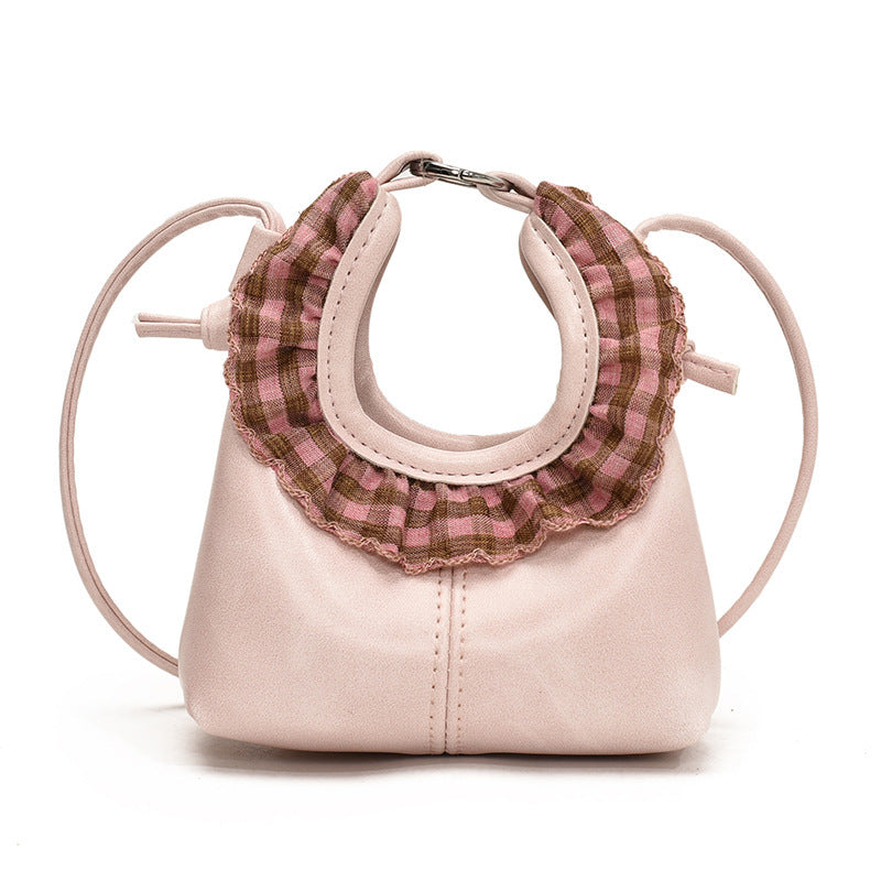 Women’s mini handbag with trendy ruffle design