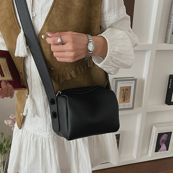 Women’s shoulder bag in modern design with structured surface