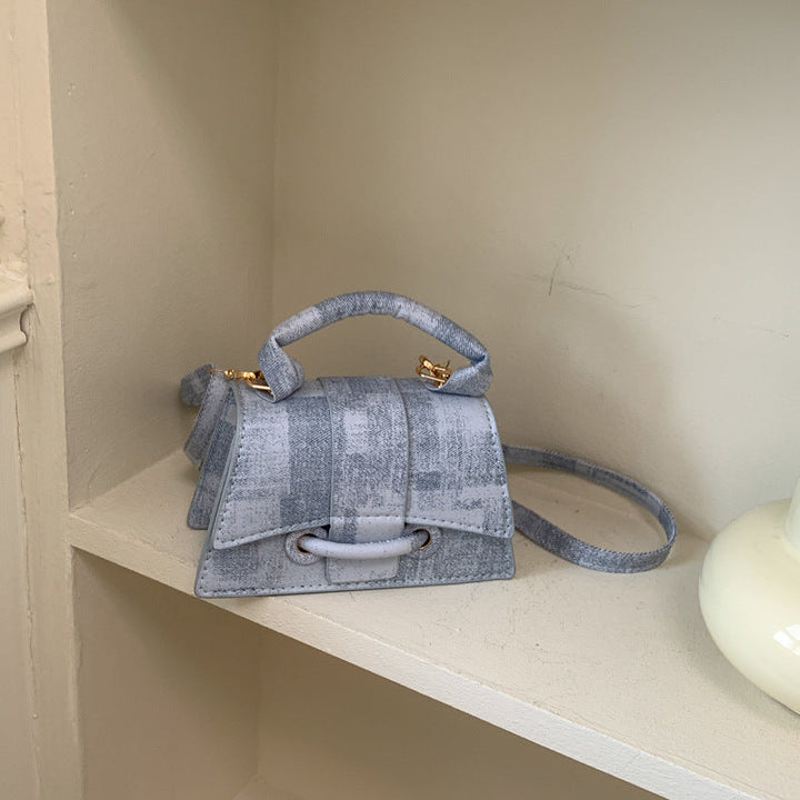 Women's elegant mini handbag with textured design