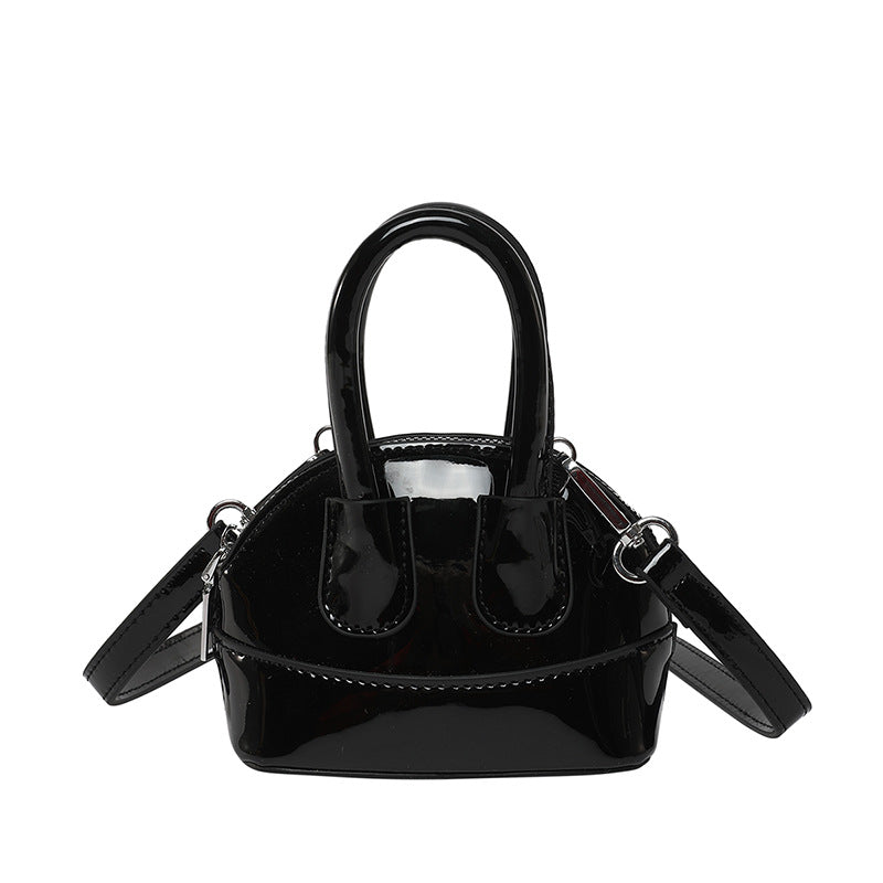Ladies mini handbag with elegant glossy finish and removable shoulder strap