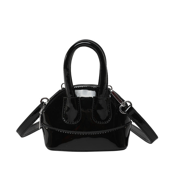 Ladies mini handbag with elegant glossy finish and removable shoulder strap