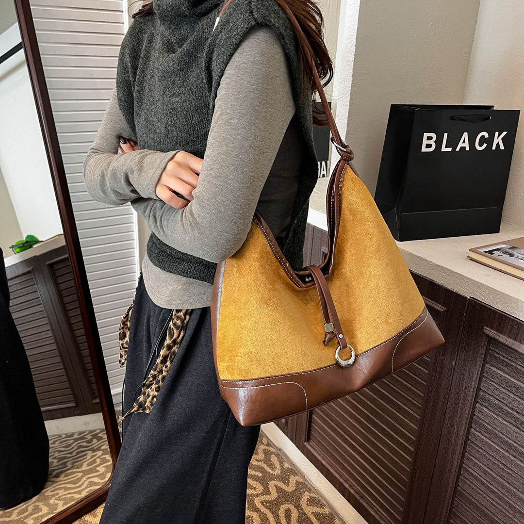 Women's elegant tote bag with authentic suede elements