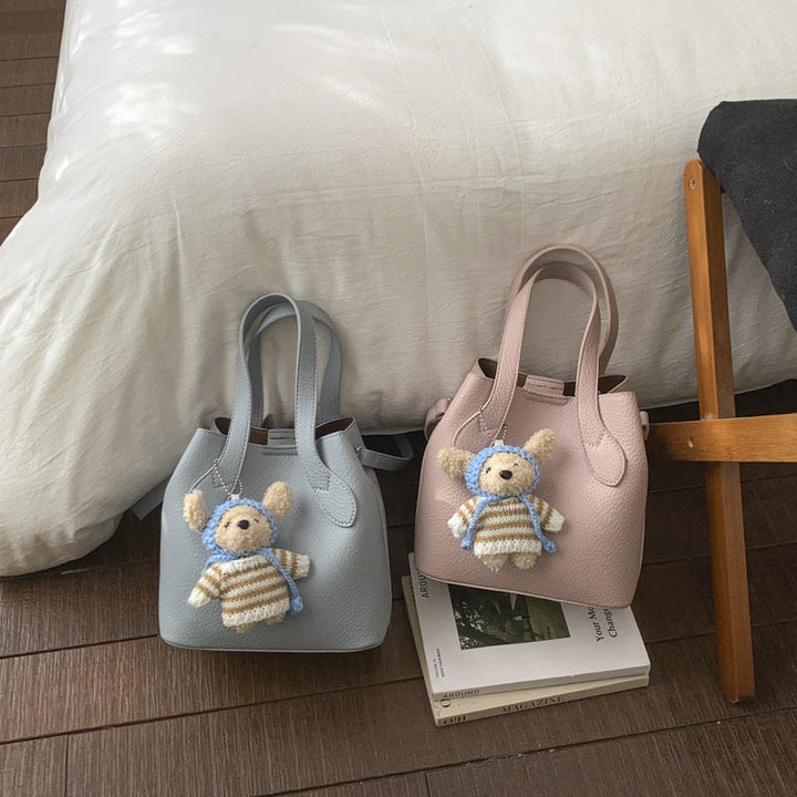 Women's mini shoulder bag with removable cosmetic pouch